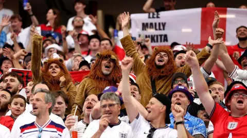 Getty Images England fans wearing lion fancy dress costumes show their support during the FIFA World Cup 2026 Group L match between England and Croatia at Dallas Stadium on June 17, 2026 in Dallas, Texas.