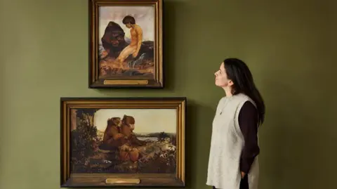 Roseberys Roseberys' Lara L'vov-Basirov admires the pictures