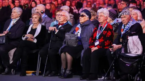 Holocaust survivors during commemoration ceremony of the 80th anniversary of the liberation of Auschwitz at Memorial and Museum Auschwitz-Birkenau former Nazi-German concentration and extermination camp 