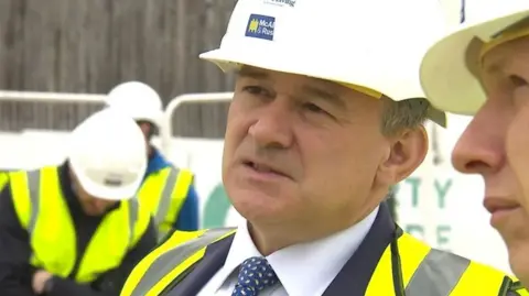 BBC Ed Davey pictured visiting the site of a former cinema that has been derelict for decades in Tumbridge Wells in 2024