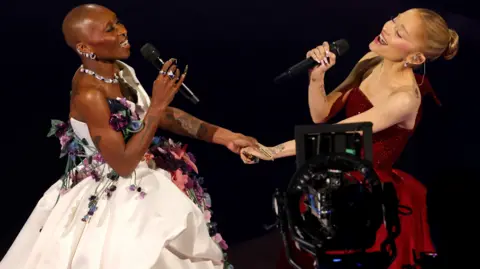  (L-R) Cynthia Erivo and Ariana Grande perform onstage during the 97th Annual Oscars at Dolby Theatre on March 02, 2025 in Hollywood, California. (Photo by Kevin Winter/Getty Images)
