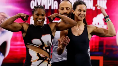 Carolin Dubois and Terri Harper jostle for position as they pose for pictures