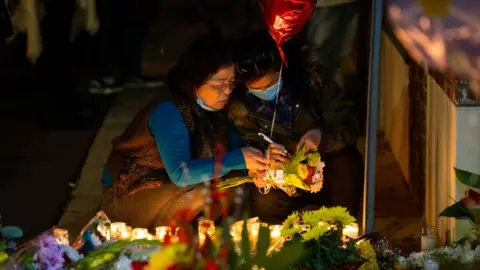 Getty Images Candlelight vigil at Star Dance Studio