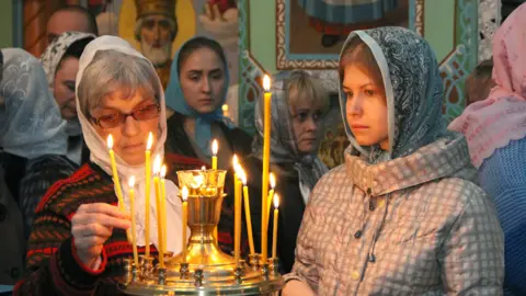 Getty Images Ukrainian worshippers in Makiivka, Donetsk region, 8 Apr 18