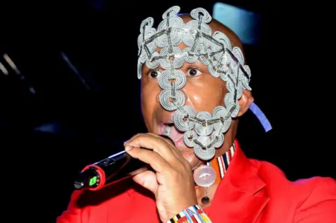 Getty Images Theo Kgosinkwe singing during the Welcome Dinner of the Mandela 100 Global Citizen Festival in Johannesburg, South Africa - Saturday 1 December 2018