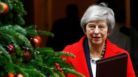 Reuters Theresa May leaving Downing Street