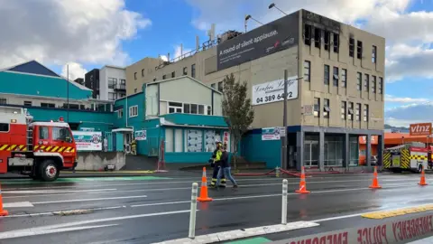 EPA Hostel building with fire damage on windows on the top floor