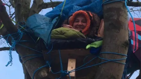 Save The 32 Maples Campaigner occupying a tree