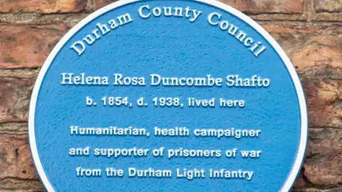 Durham County Council The blue plaque installed on 9 South Bailey in Durham City, where Helena Rosa Duncombe Shafto once lived.