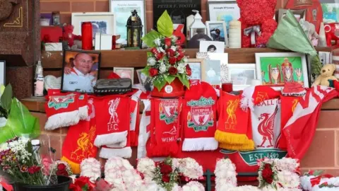 PA Media Flowers and tributes at Hillsborough memorial