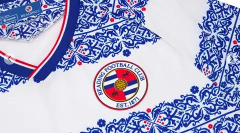 Reading FC Close up image of the blue, white and red Victorian-inspired pattern.
