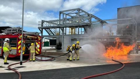 Fire crews tackle blaze at training centre