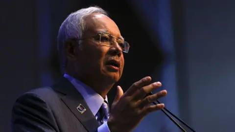 Getty Images Malaysian Prime Minister Najib Razak speaks during the Budget Revision in Putrajaya on January 20, 2015