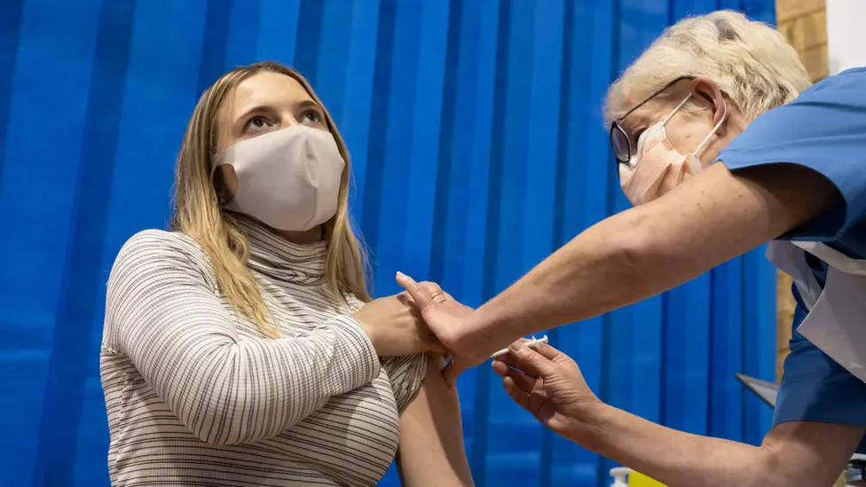 Getty Images Woman having a vaccine in Cardiff