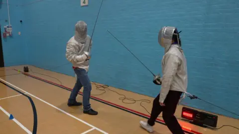 BBC A photo of fencing at one of the sessions