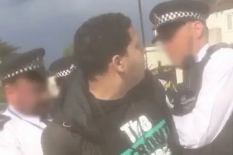 Handout Kusai Rahal being arrested