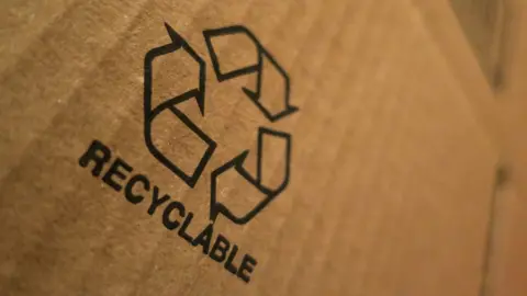 Getty Images Recyclable sign on cardboard