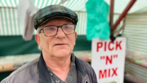 Kevin Hilliard at his sweet stall at Saxmundham market