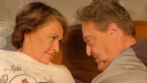 Adam Rose/ABC Roseanne Barr and John Goodman