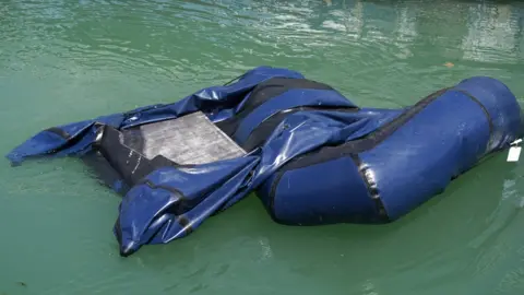PA Media Partially deflated boat
