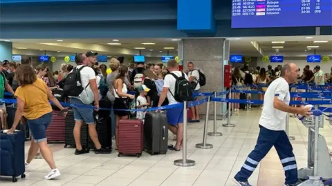 Lynsey Fitzpatrick Queues and delays at Rhodes Airport