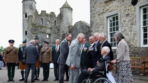 Reuters Britain's King Charles meets with military veterans as he visits Enniskillen Castle, Enniskillen,