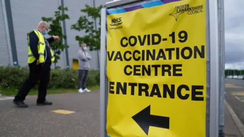 PA Media vaccine centre sign