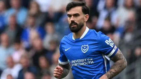 Marlon Pack in action for Portsmouth against Birmingham City at Fratton Park in May 2026