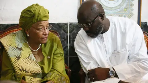 EPA Ms Sirleaf (L) and Mr Weah (R)