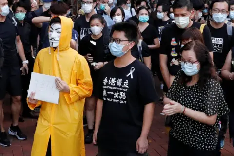 Reuters Hong Kong activist dubbed "Captain America 2.0" Ma Chun-man attends a vigil for a protester Marco Leung Ling-kit who fell to his death during a demonstration outside the Pacific Place mall, in Hong Kong, China June 15, 2020.