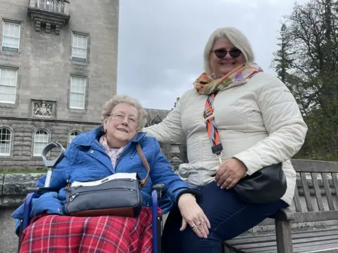 PA Media Gwen Smith and her daughter in law Louise Gibson-Ellis