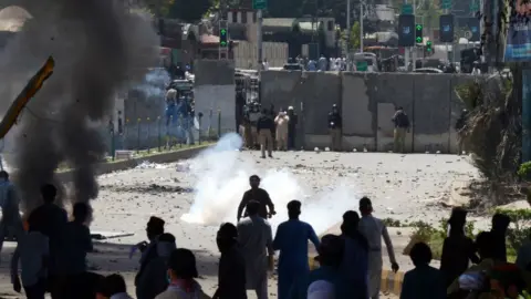 Getty Images Imran Khan's supporters clashed with police in Peshawar on May 10