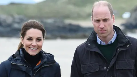 WPA Pool/Getty Images  The Royal couple explored Newborough Beach in 2019