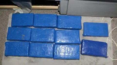 West Yorkshire Police Blocks of cocaine found during a police raid in Leeds
