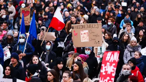 Getty Images A protest in Krakow over the death of a pregnant woman