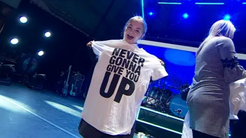 Child with promotional T-shirt