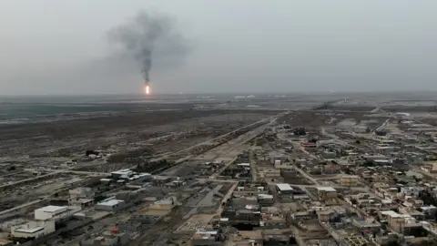 Essam Abdullah Mohsin/BBC News Aerial shot of West Qurna oil field