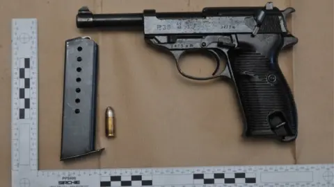 North Wales Police Hand gun