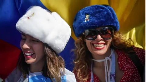 Getty Images Football fans from Argentina sing songs and enjoy the party atmosphere of The World Cup near Red Square