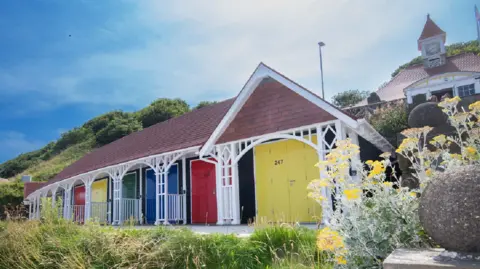 Restored beach huts on Scarborough's South Cliff