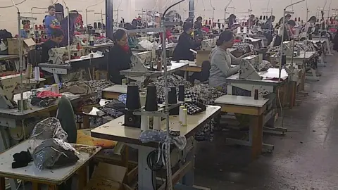 Alkesh Kapadia Alkesh Kapadia's factory, pictured producing garments in Leicester before he moved production overseas 