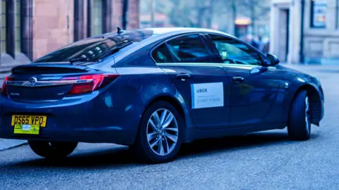 Getty Images Uber car service in Coventry City Center - stock photo