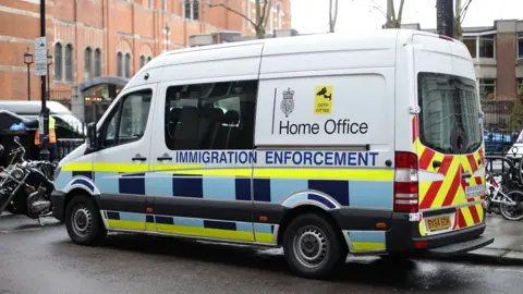 A stock photo of a Home Office immigration enforcement van from 2017.