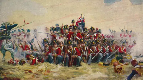 Getty Images An illustration shows soldiers of the Royal Scots regiment formed into a defensive square with bayonets during the Battle of Quatre Bras in June 1815. Infantry stand in formation while cavalry and battlefield activity surround them. The image is from Battles for the Flag, a set of cards given away with a British boys' comic.