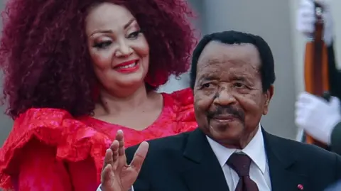 Chantal Biya (L) and Paul Biya (R) on a visit to China last year.