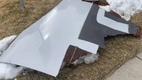 Broomfield PD via EPA Debris from the engine of a Boeing 777 which failed during take-off from Denver, 20 February