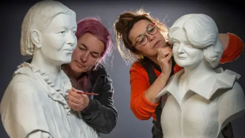 Busts of Maggie Keswick Jencks and Mary Slessor and their sculptors