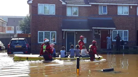 West Midlands Fire Service Boat rescuing children