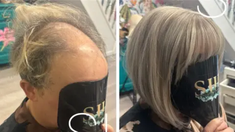 SHE Two headshots of the same woman holding a black mask to her face with a logo printed on it. The left image shows her with blonde thinning hair, the one on the right shows her with a thick, short, blonde bob haircut. In both images, the woman is wearing a black salon gown and there is a teal set of drawers in the background, a white staircase and colourful safari wallpaper.