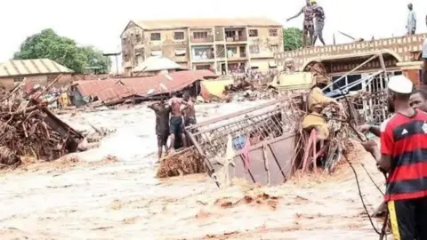 Heavily flooded area and debris in Mokwa, Nigeria